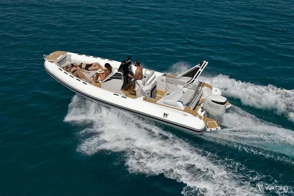 GR Boat Rental Skiathos Boat Hire Skiathos Rent Tiger Topline Limited Edition in Skiathos for up to 10 people, featuring a powerful 300hp engine, sunbathing area, refrigerator, music system, and onboard shower. Perfect for private family tours and snorkeling adventures with a professional skipper included.