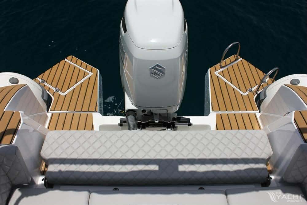 GR Boat Rental Skiathos Boat Hire Skiathos Rent Tiger Topline Limited Edition in Skiathos for up to 10 people, featuring a powerful 300hp engine, sunbathing area, refrigerator, music system, and onboard shower. Perfect for private family tours and snorkeling adventures with a professional skipper included.