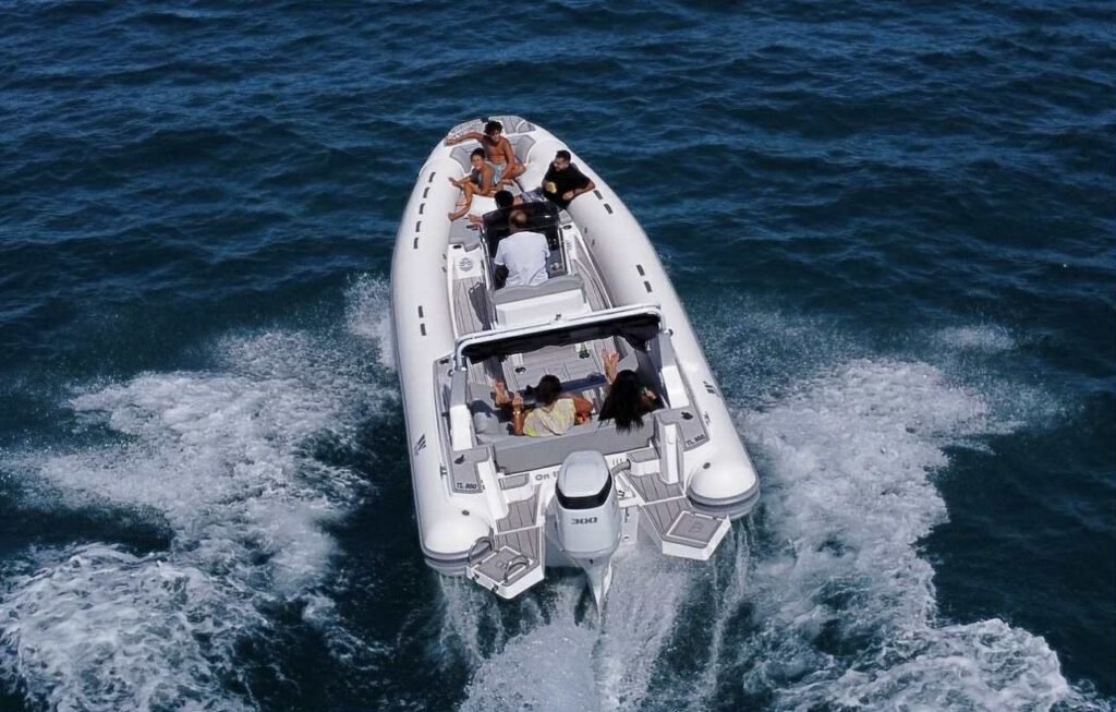 GR Boat Rental Skiathos Boat Hire Skiathos Rent Tiger Topline Limited Edition in Skiathos for up to 10 people, featuring a powerful 300hp engine, sunbathing area, refrigerator, music system, and onboard shower. Perfect for private family tours and snorkeling adventures with a professional skipper included.