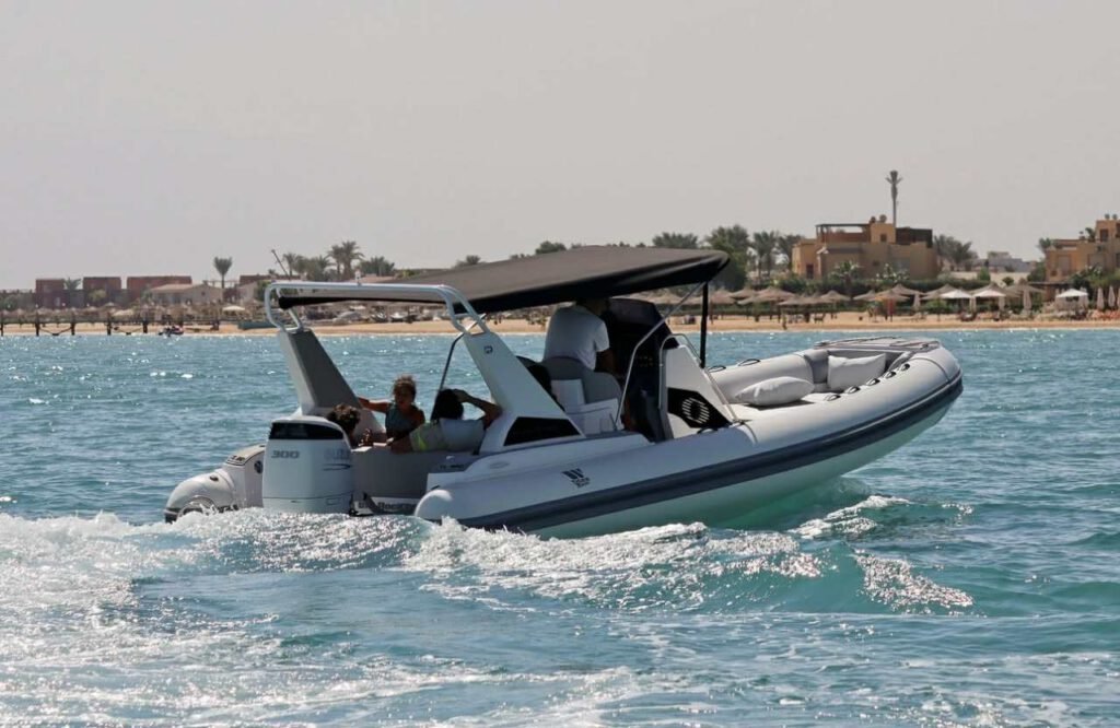 GR Boat Rental Skiathos Boat Hire Skiathos Rent Tiger Topline Limited Edition in Skiathos for up to 10 people, featuring a powerful 300hp engine, sunbathing area, refrigerator, music system, and onboard shower. Perfect for private family tours and snorkeling adventures with a professional skipper included.