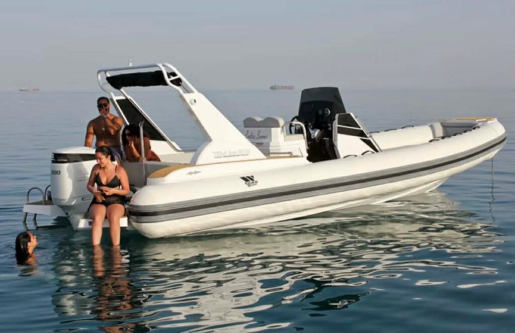 GR Boat Rental Skiathos Boat Hire Skiathos Rent Tiger Topline Limited Edition in Skiathos for up to 10 people, featuring a powerful 300hp engine, sunbathing area, refrigerator, music system, and onboard shower. Perfect for private family tours and snorkeling adventures with a professional skipper included.